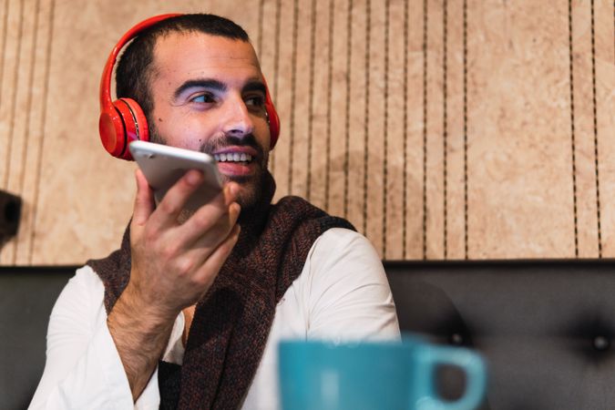 Male freelancer sending voice message