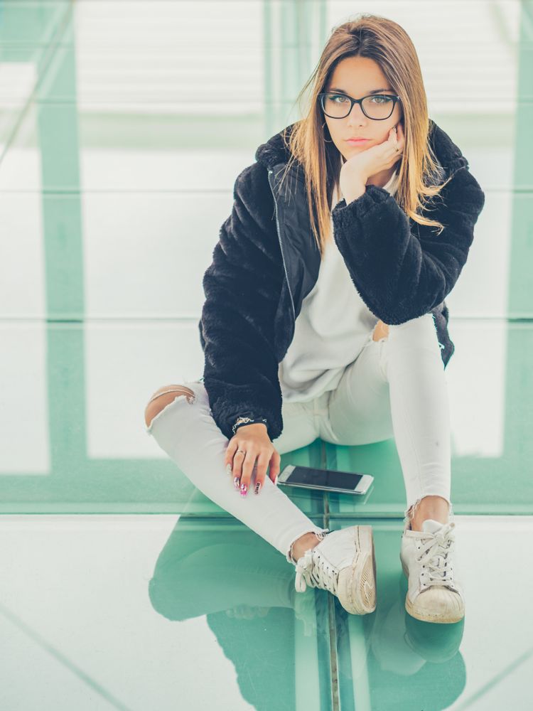 Young woman over a glasses ground