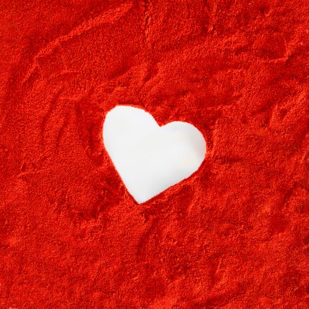 Heart shape surrounded by red soil