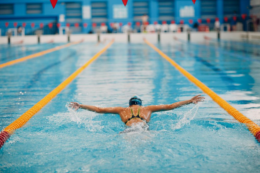 Woman swimming in the pool