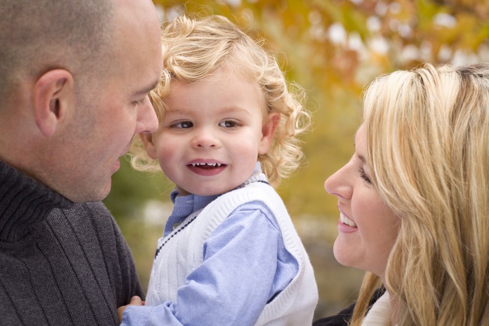 Mother, Father and Child Portrait in Park