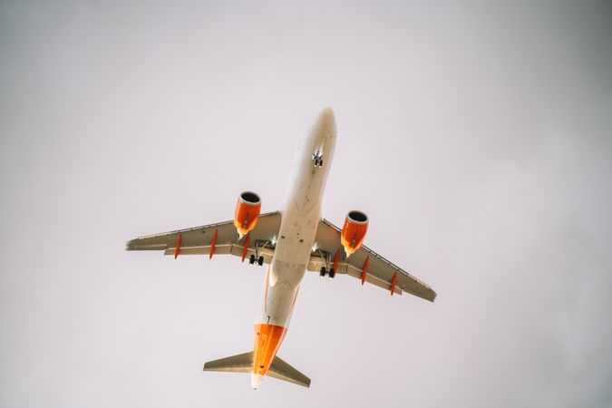 Big plane under grey sky