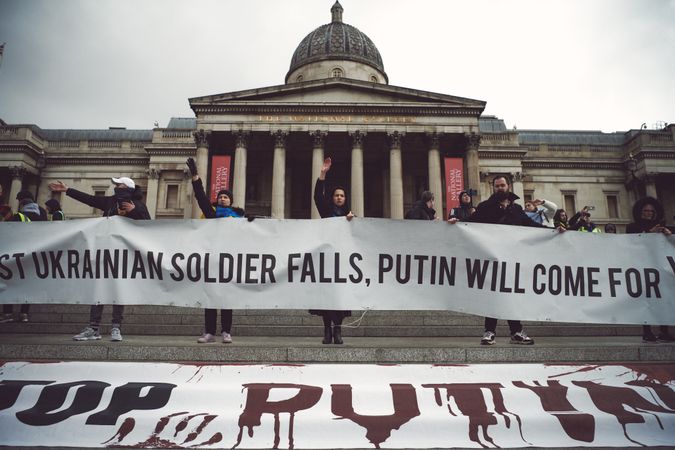 London, England, United Kingdom - March 5 2022: People with anti-Putin banner in Trafalgar Square