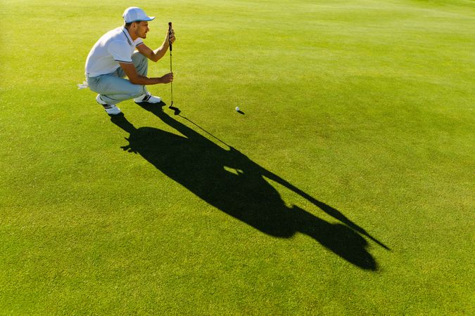 Golfer thinking about his next shot