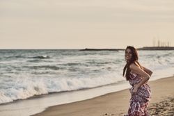 Smiling young woman on beach