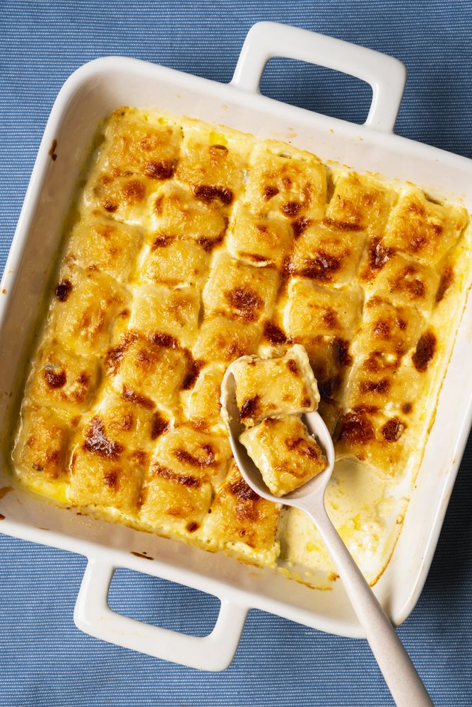 Close up of roasted cheese gnocchi in a dish
