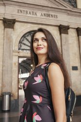 Woman standing at train station