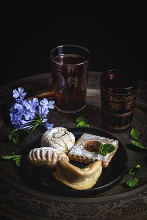 Traditional tea with mint and assorted Arab sweets