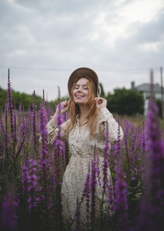 Romantic women in salvia field