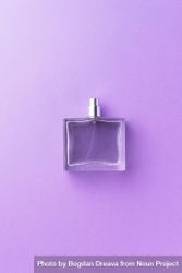 Perfume bottle over purple background bGMnB5