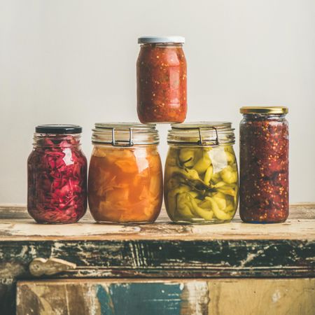 Jars of pickled and fermented food, and relishes
