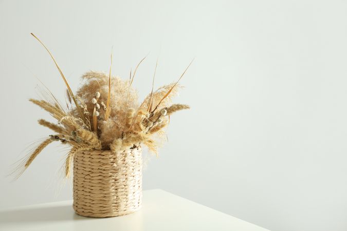Basket of dried floral arrangement with copy space