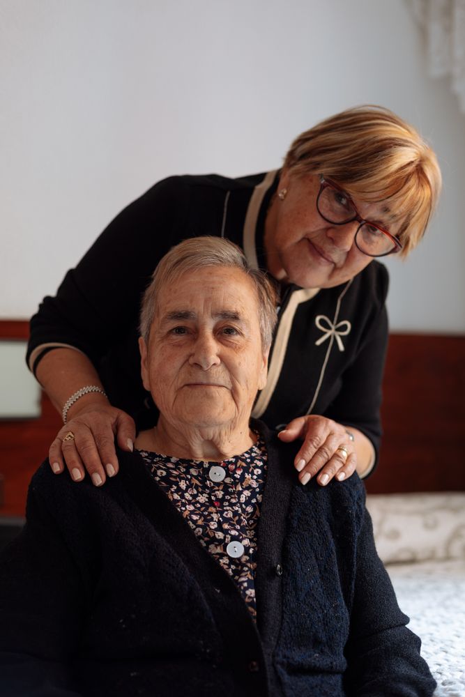 mature woman served by her daughter