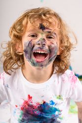 Cheerful boy with painted face