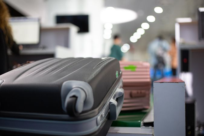 Luggage at check in counter at airport