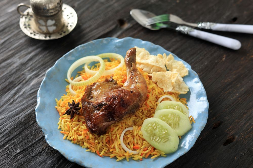 Nasi Kebuli Kabli Ayam Chicken Pilav on Blue Plate