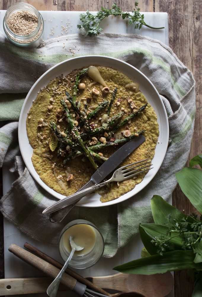 Served vegetarian crepe with oats and asparagus