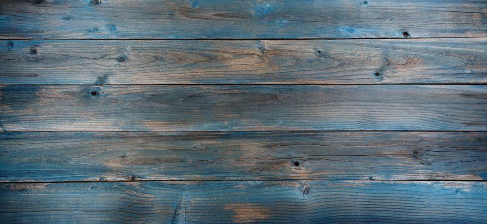 Fading blue color wooden planks