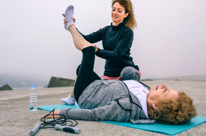 Older woman with personal trainer