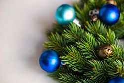Close up of Christmas wreath with blue baubles