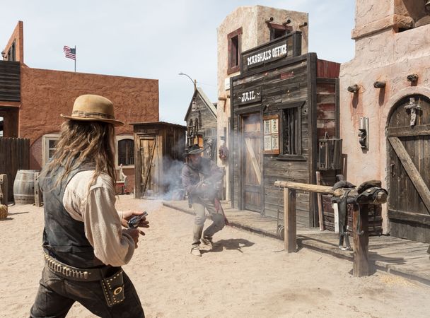 Two cowboys duel in Western theme park’s movie set