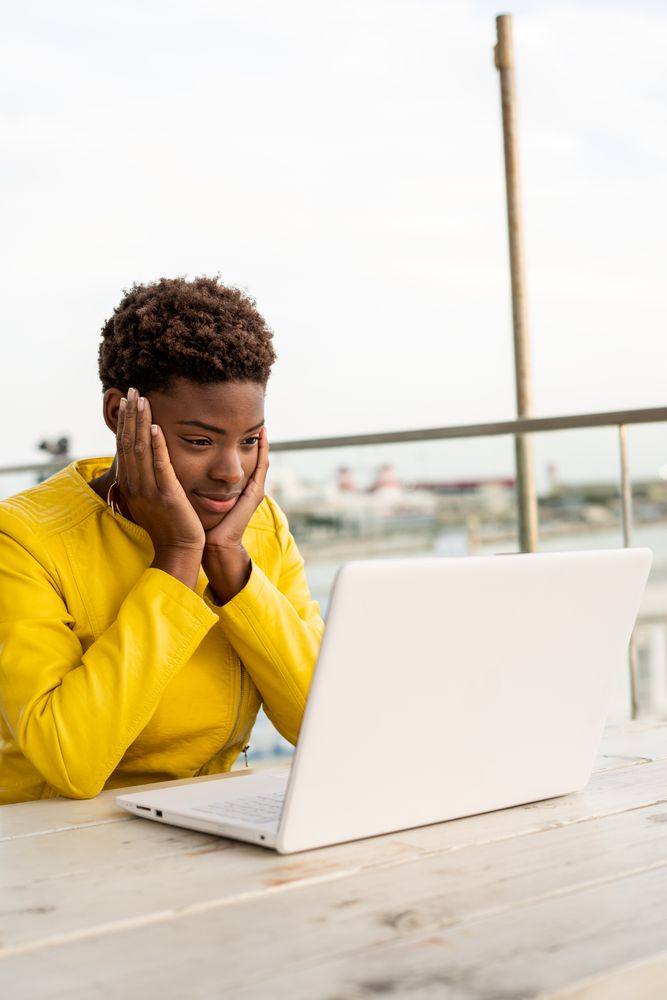 Female working on laptop at table