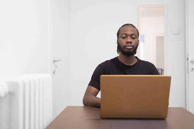 Reflected Focus: Studying in a Modern Home.