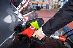 Hand Refueling Car – Oil Crisis and Green Transition
