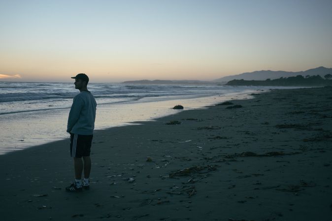 Side view of man on beach in California