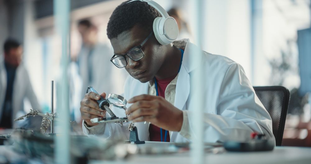 Professional Man Listening to Music, Working on Technological Project For a Startup