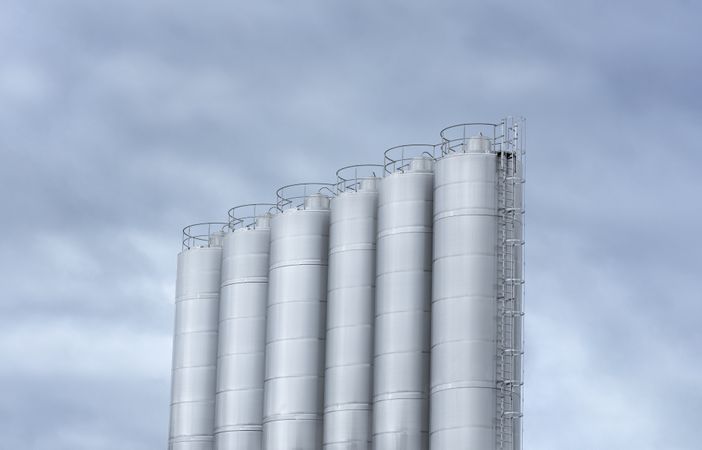 Industrial stainless steel tanks at a modern factory