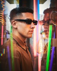 Stylish young man in sunglasses and corduroy