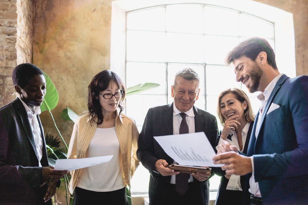 Business team discussing strategy in bright room