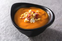 Bowl with salmorejo ham and hard boiled egg