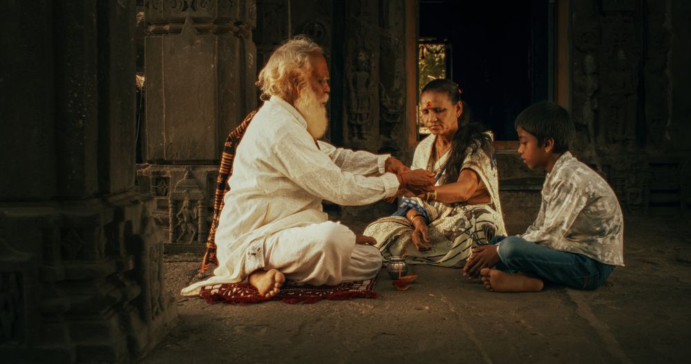 Authentic Footage of Hindu Male Kid in a Temple with a Tilaka.