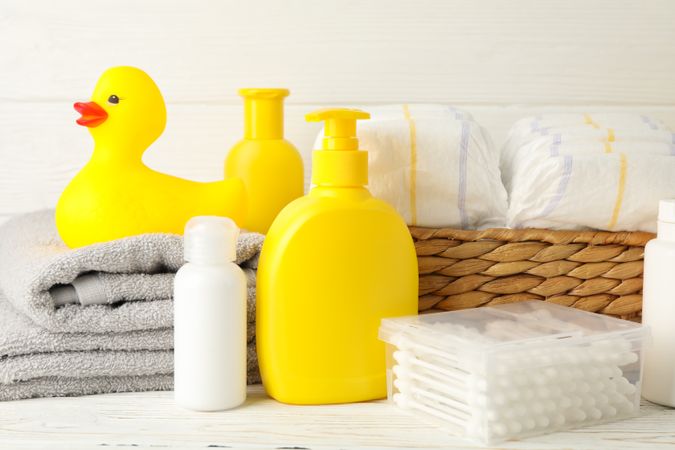 Baby hygiene accessories on  wooden background