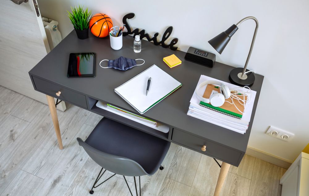 Youth bedroom interior with desk