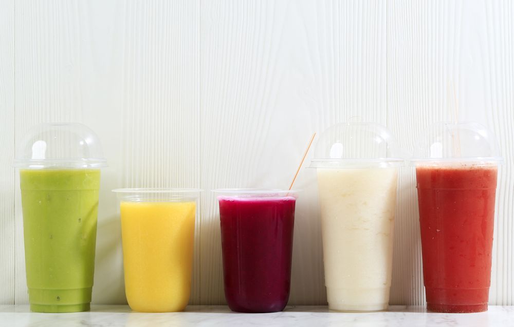 Different Color Juice on Plastic Cup Packaging