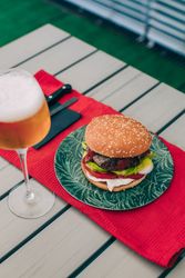 Cheeseburger with lettuce and tomato