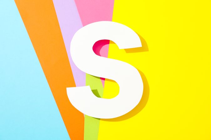 Letter S on multicolor background, space for text