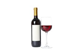 Bottle and glass with red wine isolated on blank background