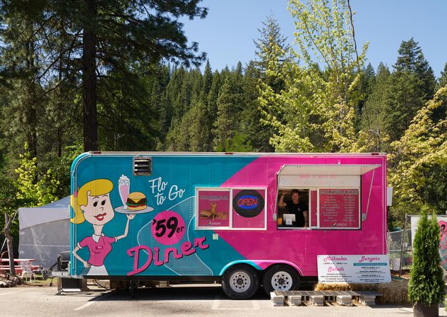 A house trailer becomes a bright pink and blue diner in the Wenatchee National Forest, Washington