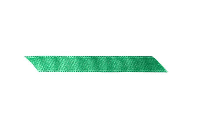 Green ribbon isolated on plain background. Gift concept