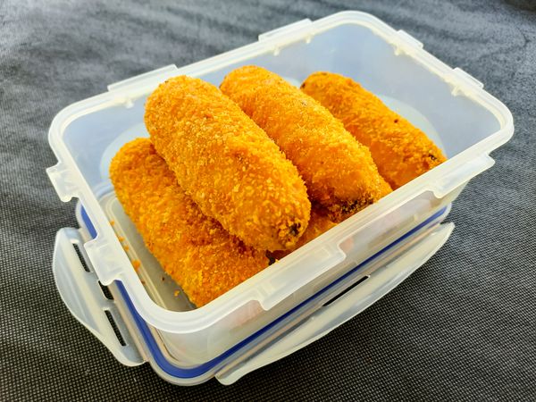 Crispy Fried Bananas in a Plastic Container