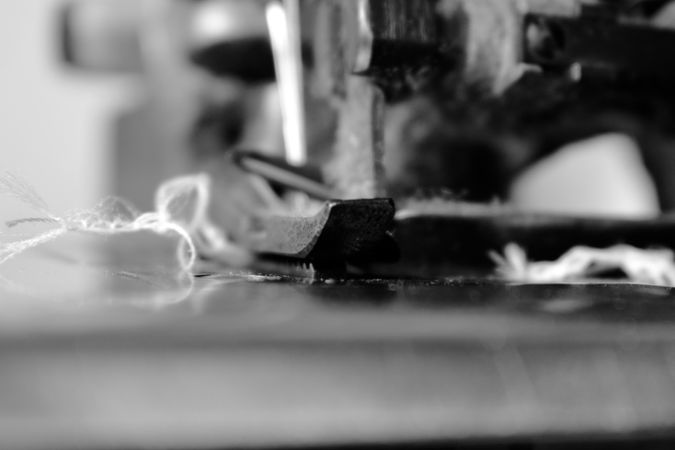 Close up of sewing machine needle