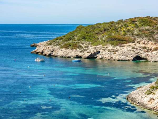 Cala Portinax bay with beautiful azure blue sea water