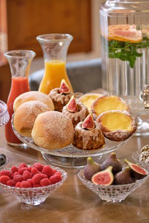 Pastry and fruits in glassware