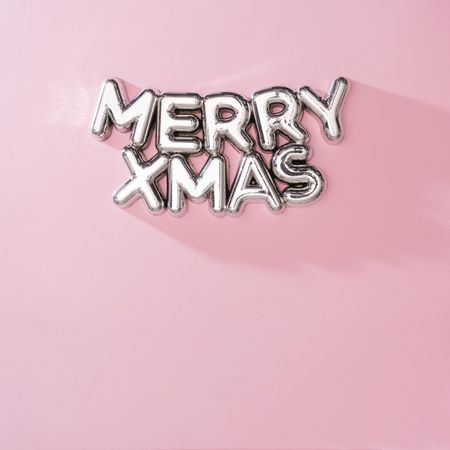 Shiny MERRY XMAS Christmas tree decoration with pink background with shadow