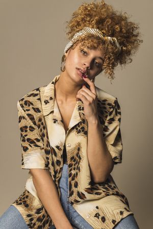 Sensual retro woman touching lip