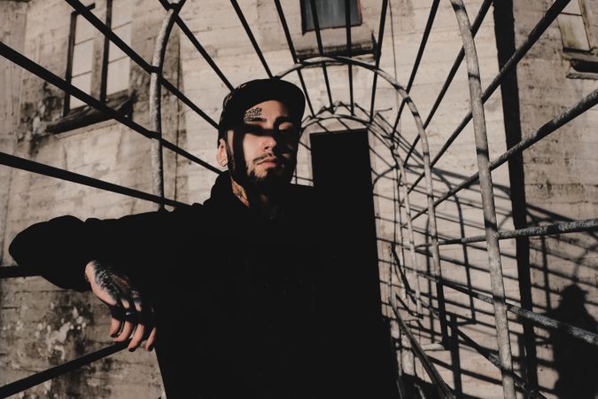 Modern man inside desolate building
